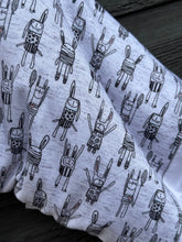 Load image into Gallery viewer, Bunny Sweater Romper - Black/ White and black bunnies for ears